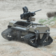 A robot tank, part of the Multi-Utility Tactical Transport (MUTT) family of systems, operates on Red Beach during an exercise at Camp Pendleton, California in 2017.